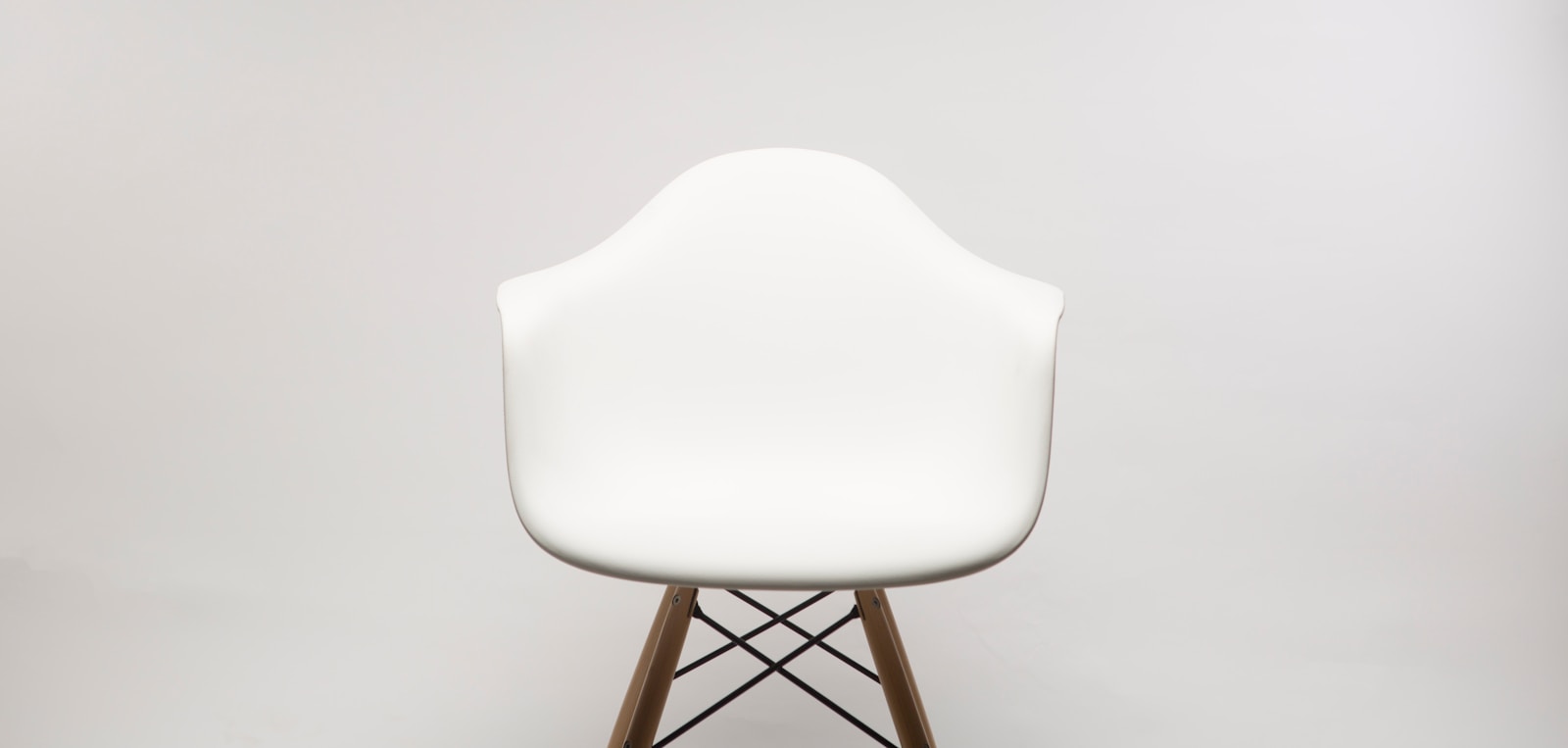 white wooden armchair